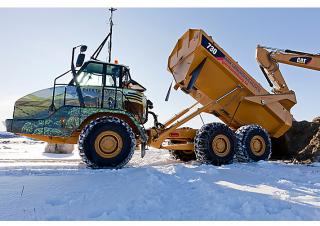 आर्टिकुलेटेड डंप ट्रक Caterpillar 730