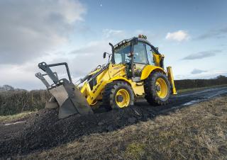 बैकहो लोडर New Holland B100C TC