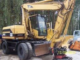 व्हील एक्सकेवेटर Caterpillar M 315 Mono