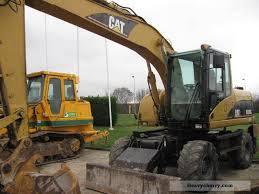 व्हील एक्सकेवेटर Caterpillar M 316 C Mono