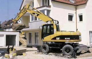 व्हील एक्सकेवेटर Caterpillar M 316 C Mono