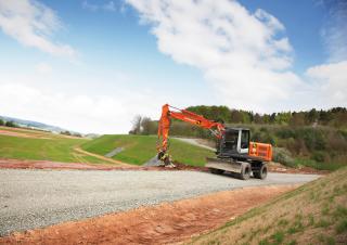 व्हील एक्सकेवेटर Hitachi ZX 140 W 3