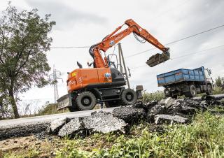 व्हील एक्सकेवेटर Hitachi ZX 140 W 5