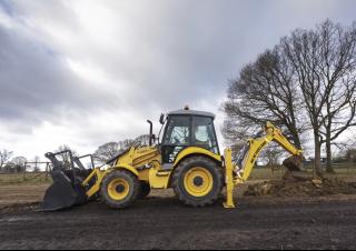 बैकहो लोडर New Holland B110C TC