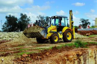 बैकहो लोडर New Holland B110C TC