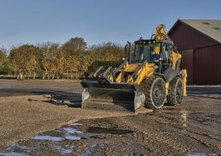 बैकहो लोडर New Holland B115C