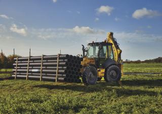 बैकहो लोडर New Holland B115C