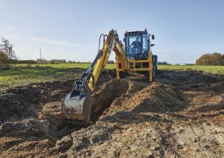 बैकहो लोडर New Holland B115C