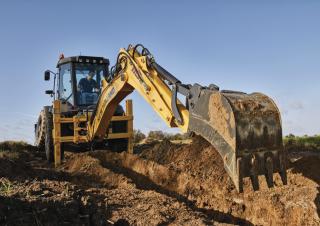 बैकहो लोडर New Holland B115C