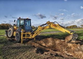बैकहो लोडर New Holland B115C