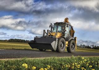 बैकहो लोडर New Holland B115C