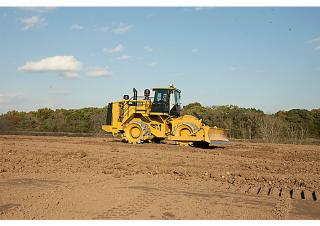 कचरा कॉम्पेक्टर Caterpillar 825K