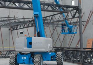 आर्टिकुलेटिंग बूम लिफ्ट व्हील्ड आर्टिकुलेटिंग बूम लिफ्ट Genie Z-80/60