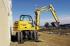 व्हील एक्सकेवेटर New Holland MH 2.6 WT