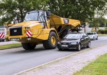 आर्टिकुलेटेड डंप ट्रक Caterpillar 730