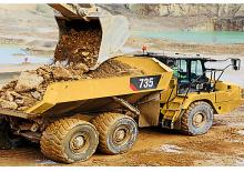 आर्टिकुलेटेड डंप ट्रक Caterpillar 735
