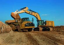 आर्टिकुलेटेड डंप ट्रक Caterpillar 740B