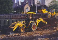 बैकहो लोडर John Deere Construction 110