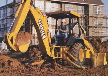 बैकहो लोडर John Deere Construction 310 E