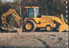 बैकहो लोडर John Deere Construction 610 C