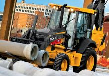 बैकहो लोडर John Deere Construction 710 K