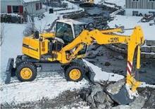 व्हील एक्सकेवेटर Liebherr A 311 Litronic