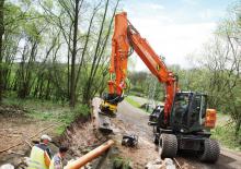व्हील एक्सकेवेटर Hitachi ZX 140 W 3