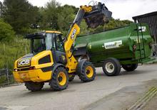 व्हील लोडर JCB TM 220 