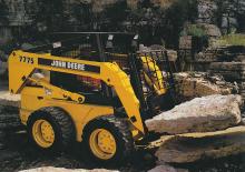 स्किड स्टीयर लोडर John Deere Construction 7775