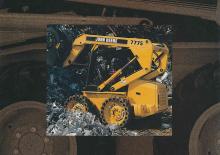 स्किड स्टीयर लोडर John Deere Construction 8875