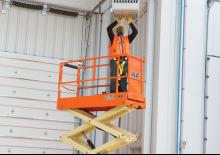 व्हील्ड सिज़र लिफ्ट JLG 2032ES