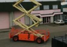 व्हील्ड सिज़र लिफ्ट Holland-Lift G 320 DL 30 4WD S/N